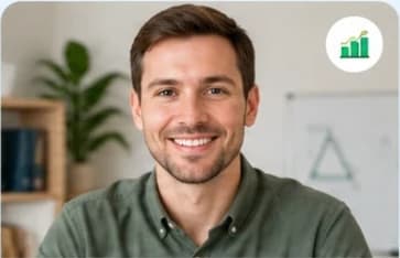 Michael T., smiling, a whiteboard behind him